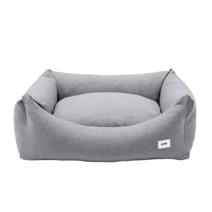 Cama para perro desenfundable CAFIDE en pana color beige arena con diseño rectangular