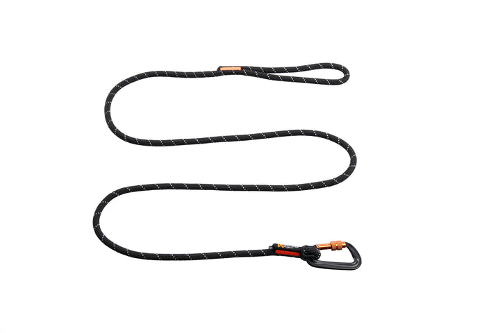 Correa Non-stop Rock Leash negra de 1,80 m con hilo reflectante y mosquetón de rosca en aluminio.