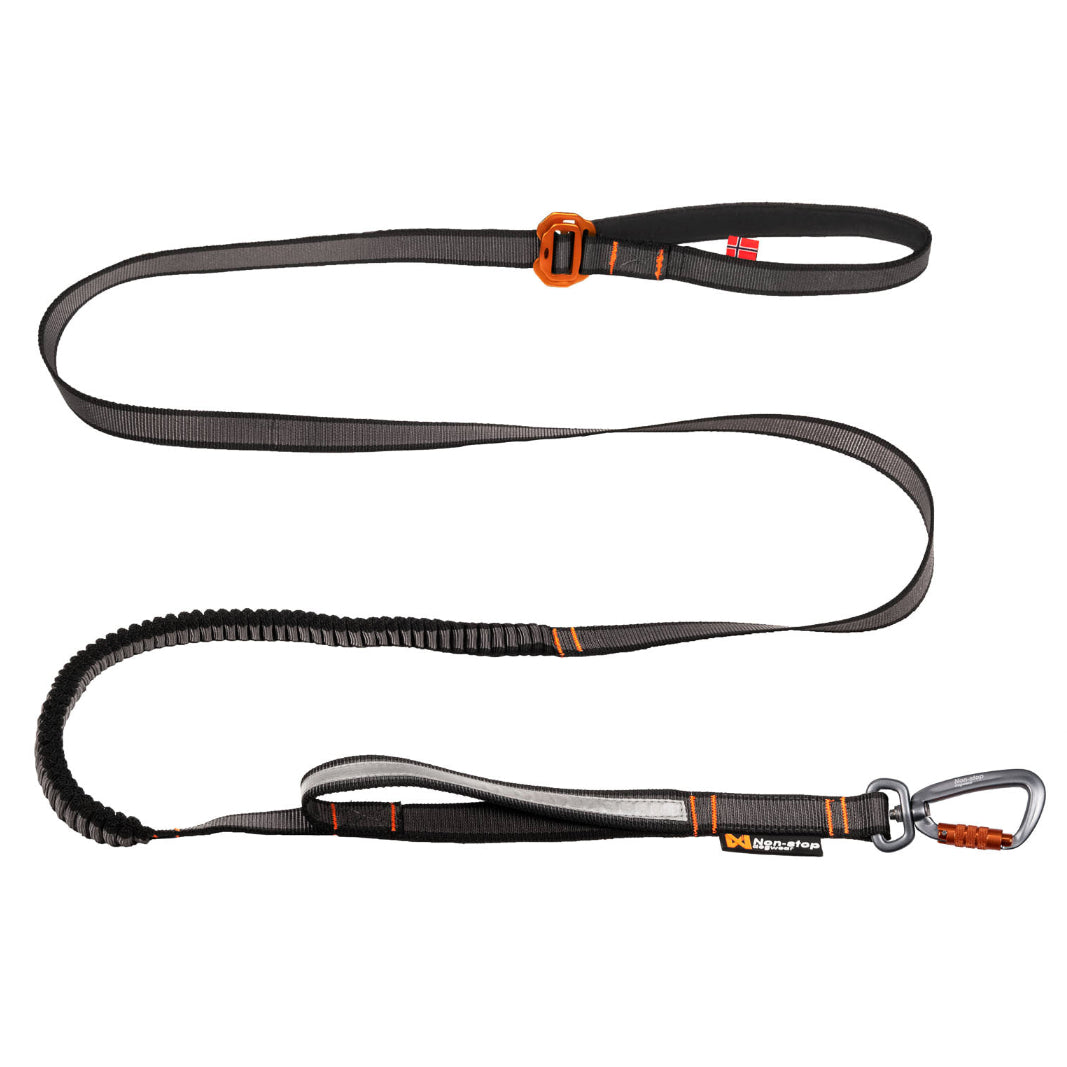 Correa para perros Non-stop Dogwear Touring Bungee Adjustable negra con sección elástica, mango acolchado y mosquetón Twistlock