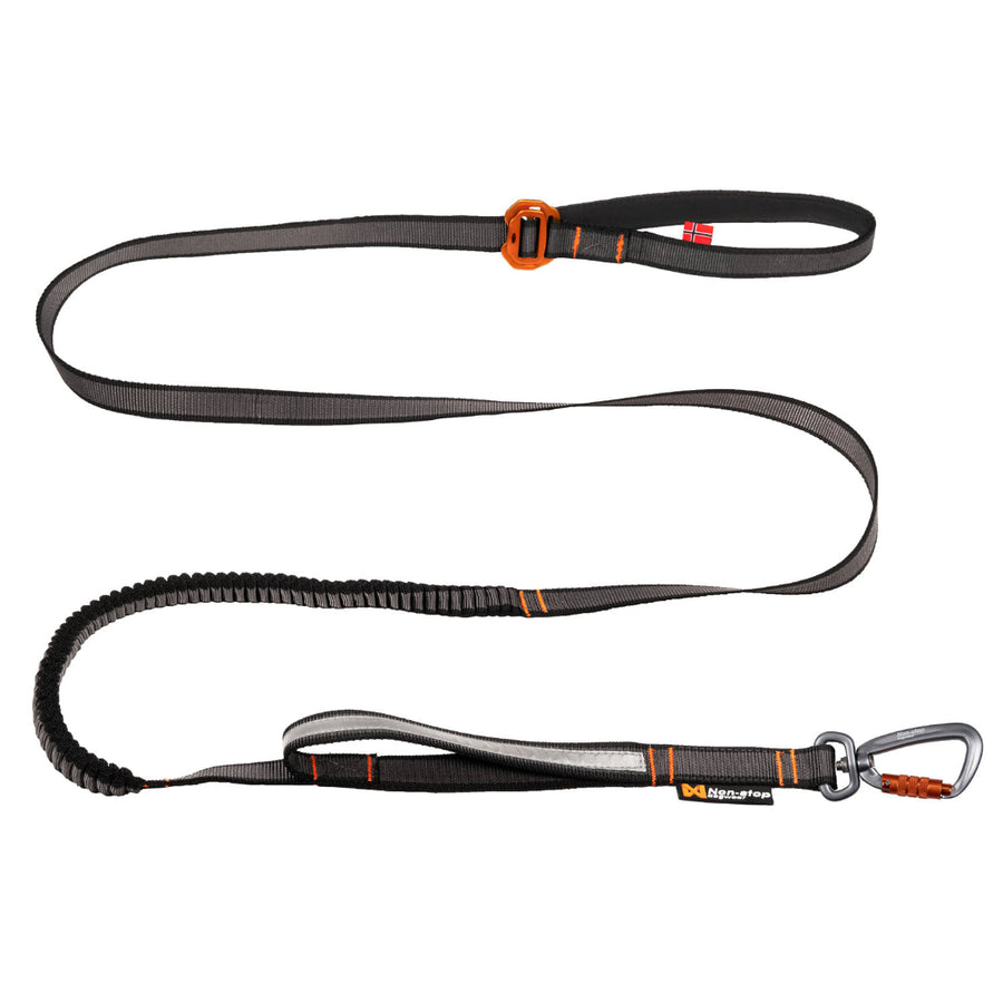 Correa para perros Non-stop Dogwear Touring Bungee Adjustable negra con sección elástica, mango acolchado y mosquetón Twistlock