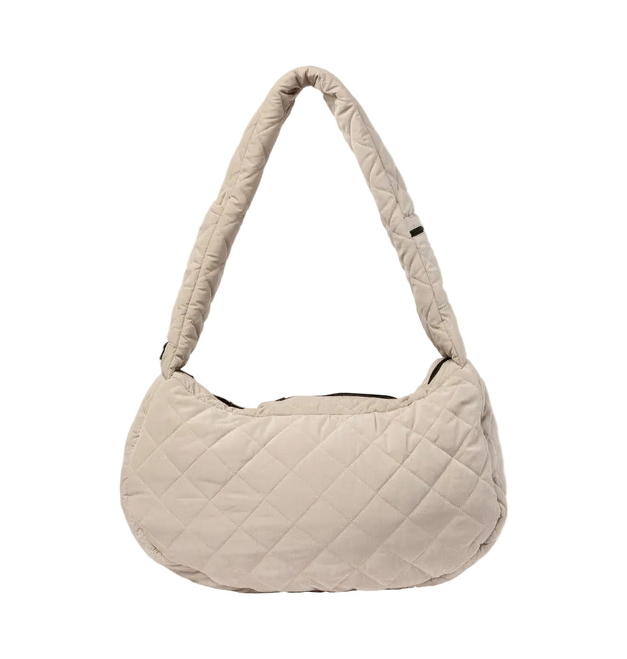 bolso bandolera de la marca Fuzzyard color beige 