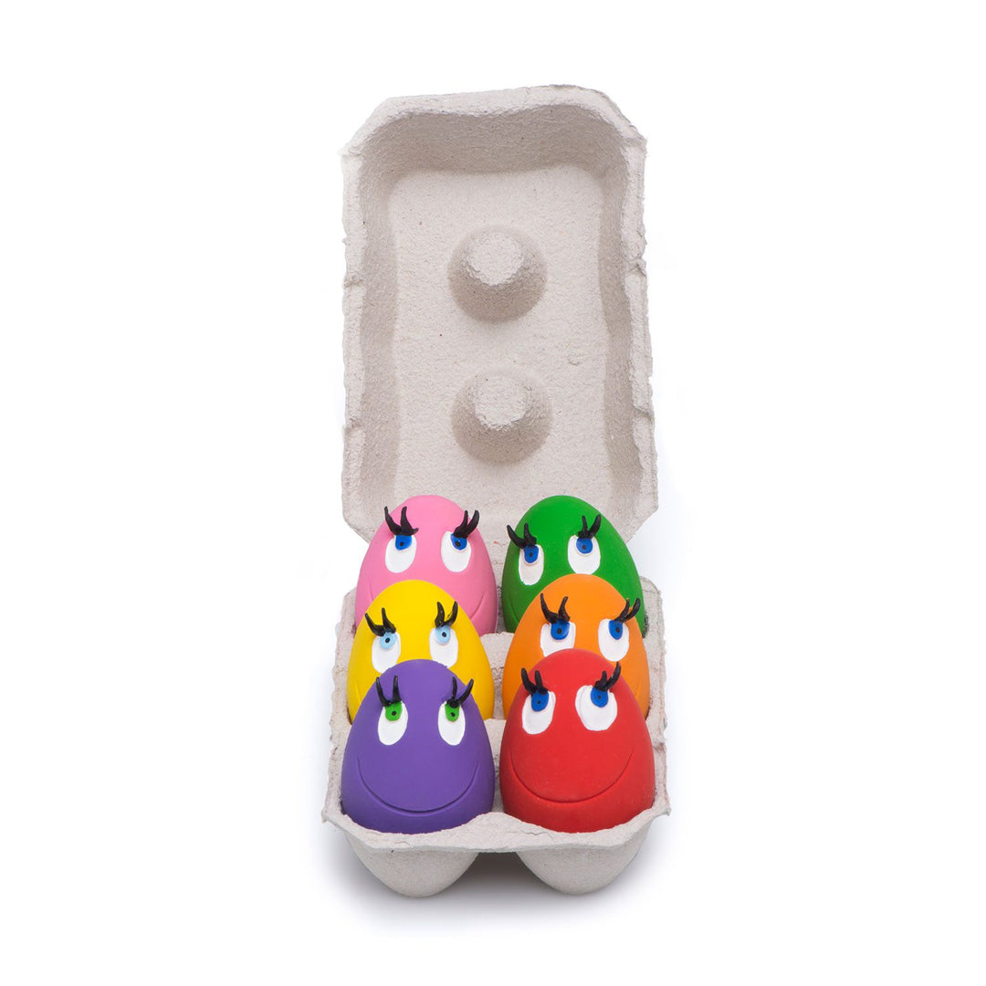 Smiley Egg amarillo tamaño medium de Lanco juguete de caucho natural con pito 11 cm para perro