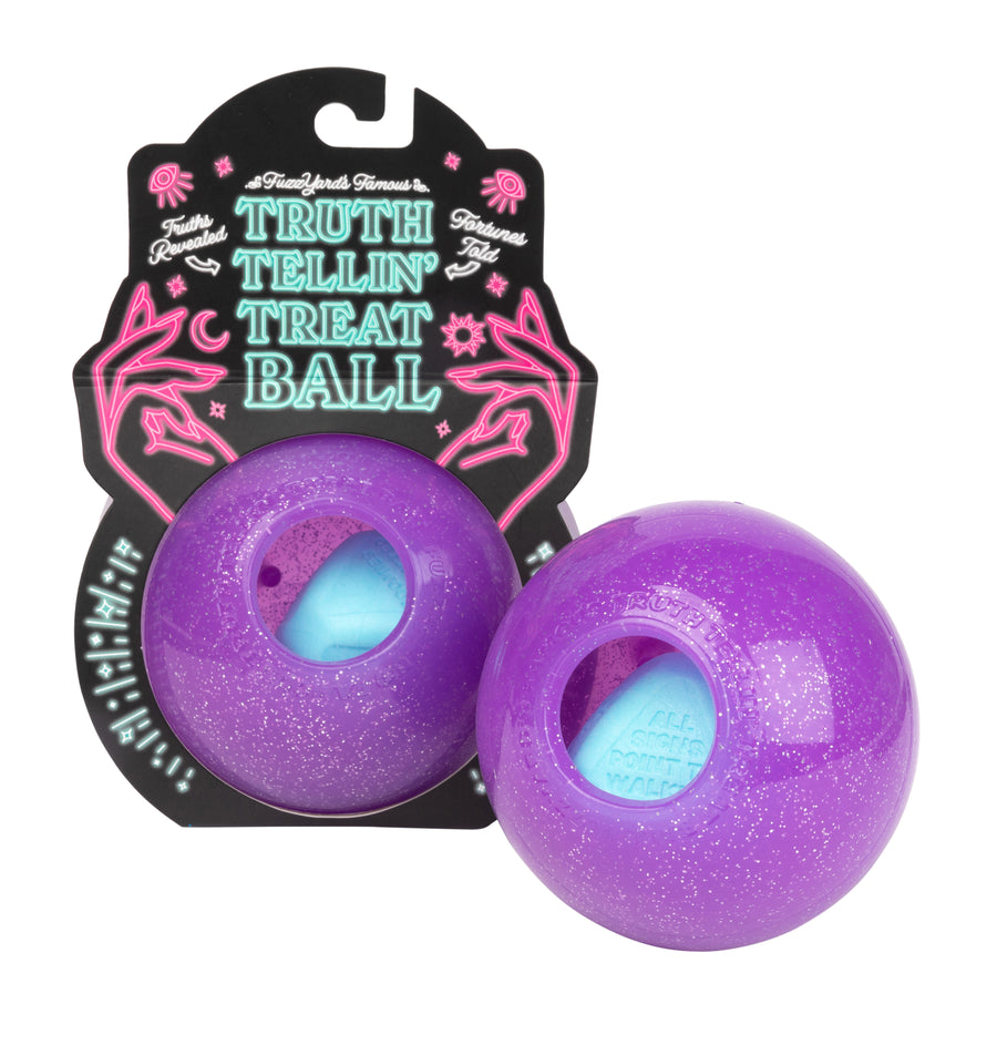 Detalle del juguete Truth Tellin’ FuzzYard para perros, bola morada con cavidad para snacks