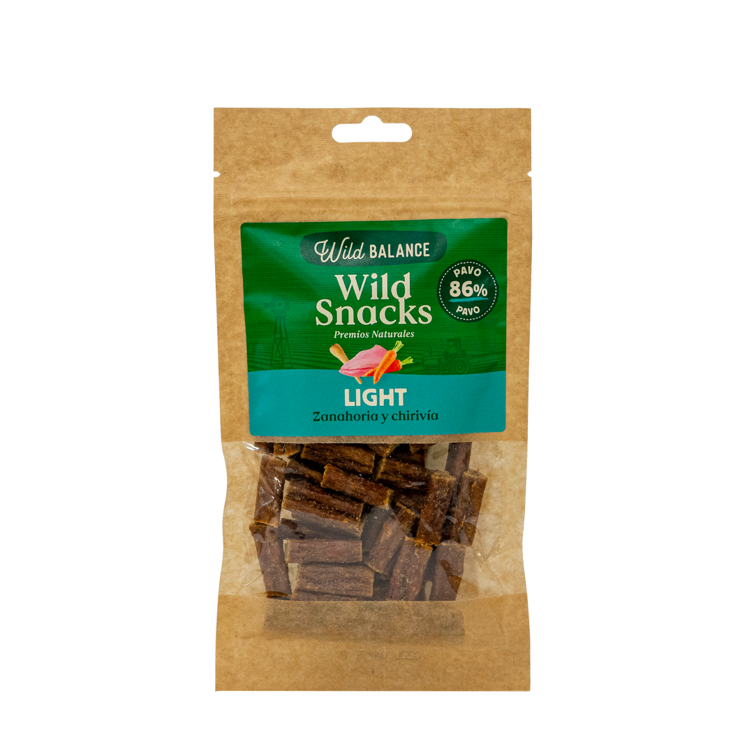 Wild Snacks Light de pavo con zanahoria y chirivía, snack natural bajo en calorías para perros que favorece la digestión.