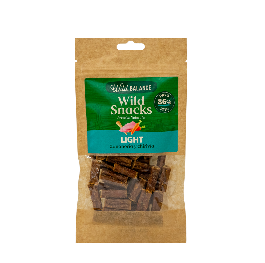 Wild Snacks Light de pavo con zanahoria y chirivía, snack natural bajo en calorías para perros que favorece la digestión.